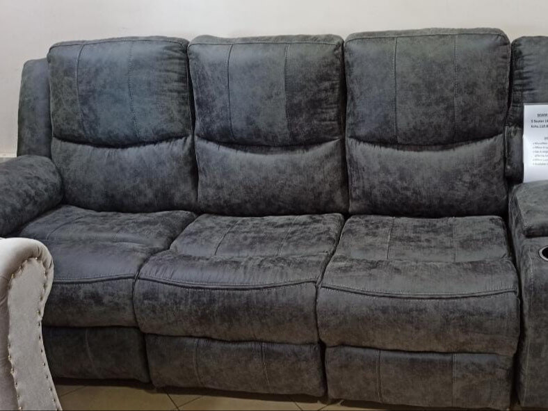 Miam charcoal grey L-shaped 6-seater sectional recliner.