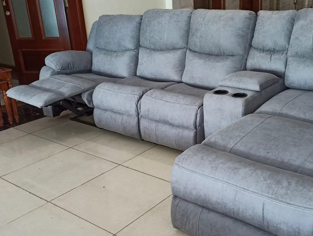 Miam grey L-shaped 6-seater sectional recliner.